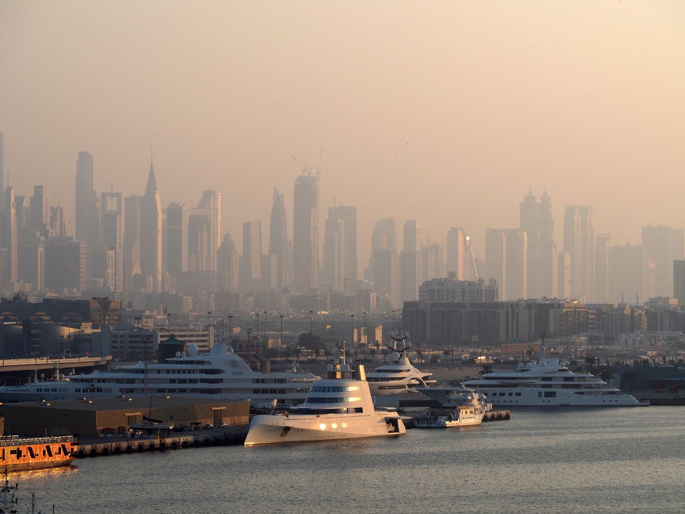 Dubai Marina with luxury yachts at morning